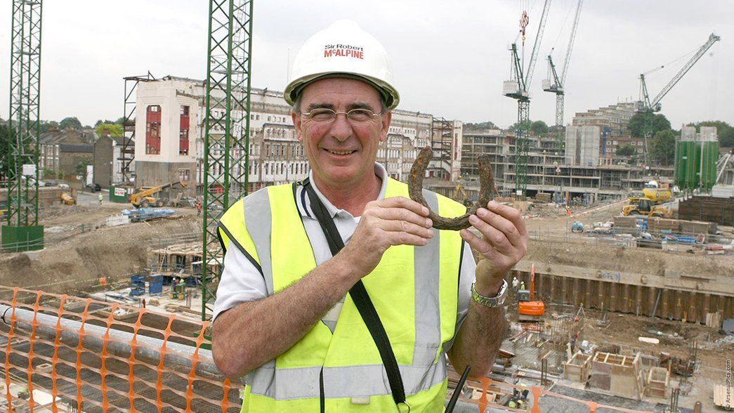 Pat Brennan with a horseshoe found beneath the North Bank