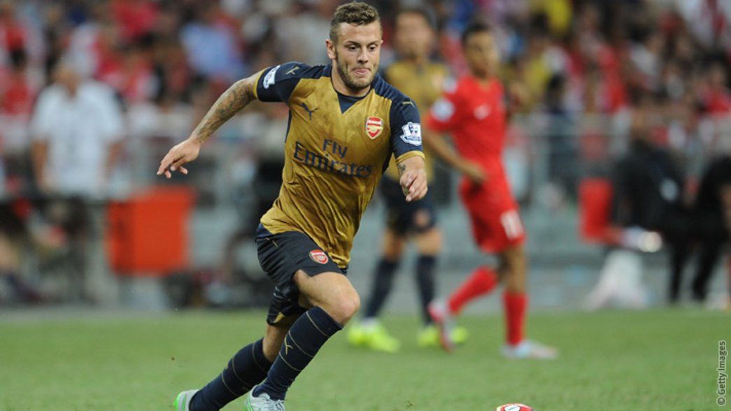 Jack Wilshere in action against a Singapore Select XI