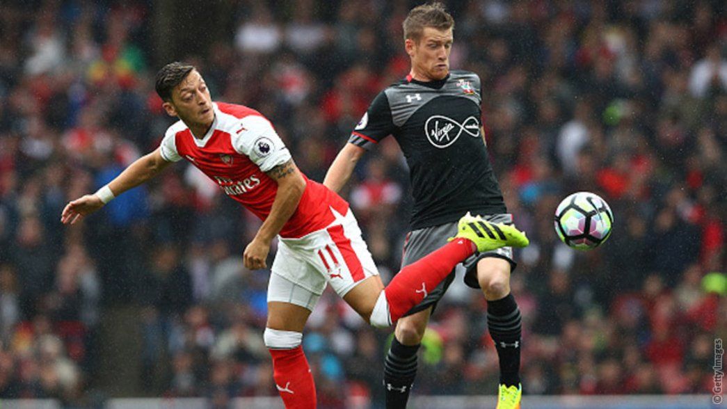 Mesut Ozil battles for the goal against Southampton
