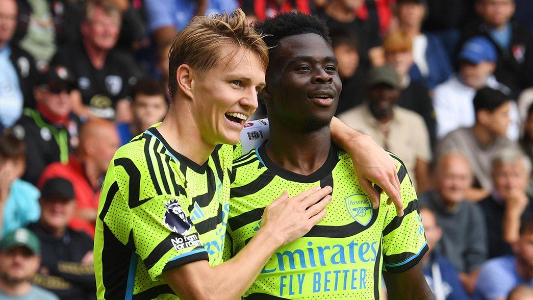 Martin Odegaard and Bukayo Saka celebrate a goal