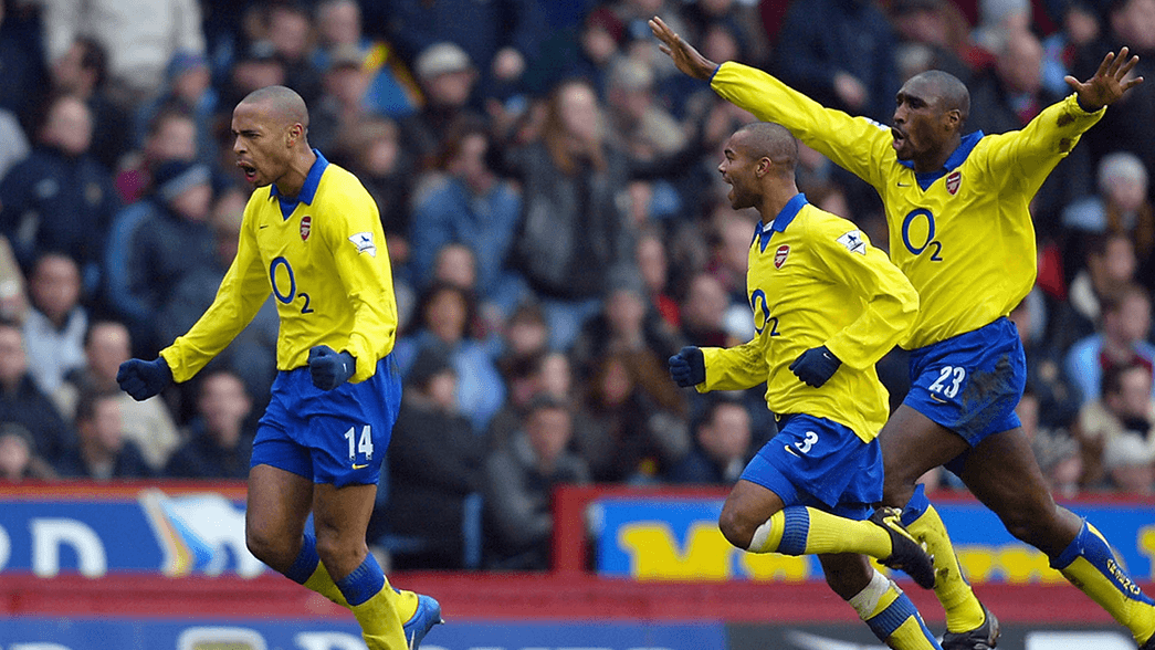Thierry Henry celebrate scoring against Aston Villa in 2004
