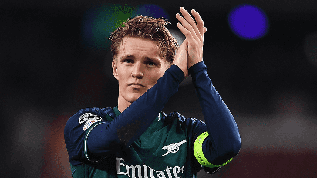 Martin Odegaard applauds the crowd after our draw against PSV