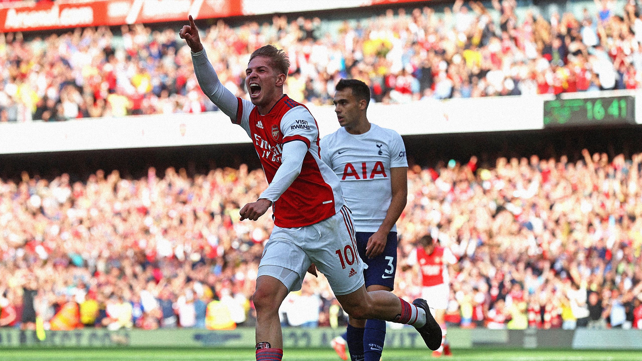 Emile Smith Rowe of Arsenal celebrates after scoring their side's first goal during the Premier League match between Arsenal and Tottenham Hotspur at Emirates Stadium on September 26, 2021