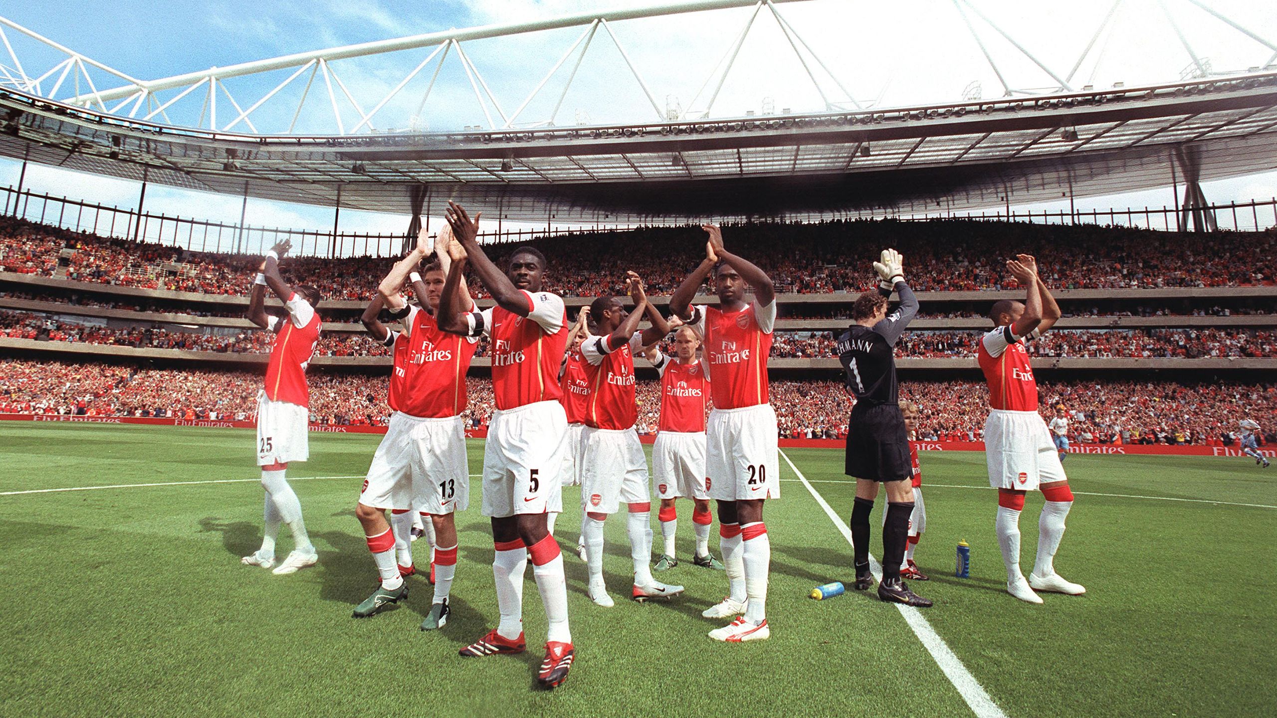 Kolo Toure and the Arsenal players clap the fans before the Premier League match between Arsenal and Aston Villa at Emirates Stadium on August 19, 2006 in London, England.