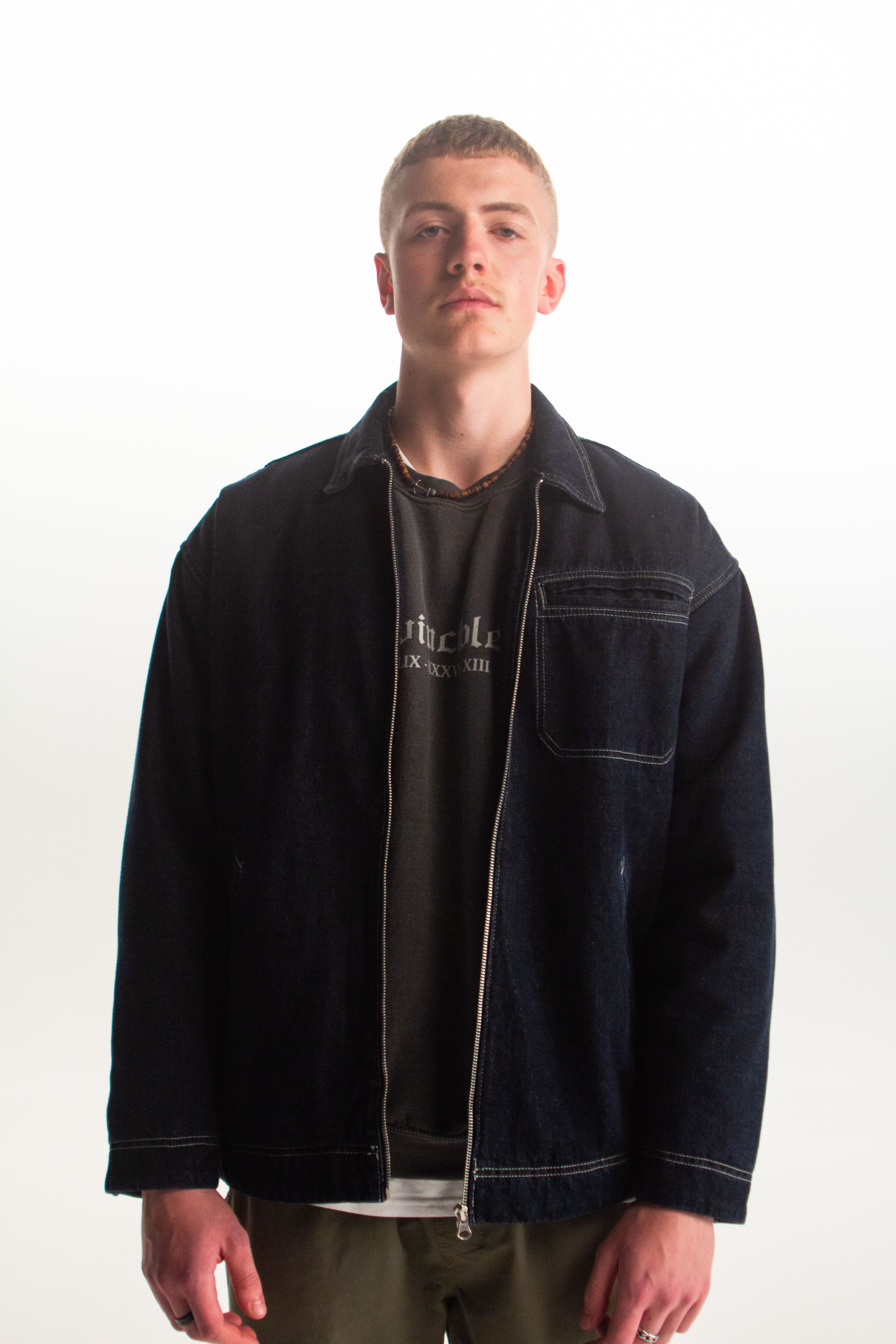 An image of an Arsenal supporter modelling the new Invincibles Collection