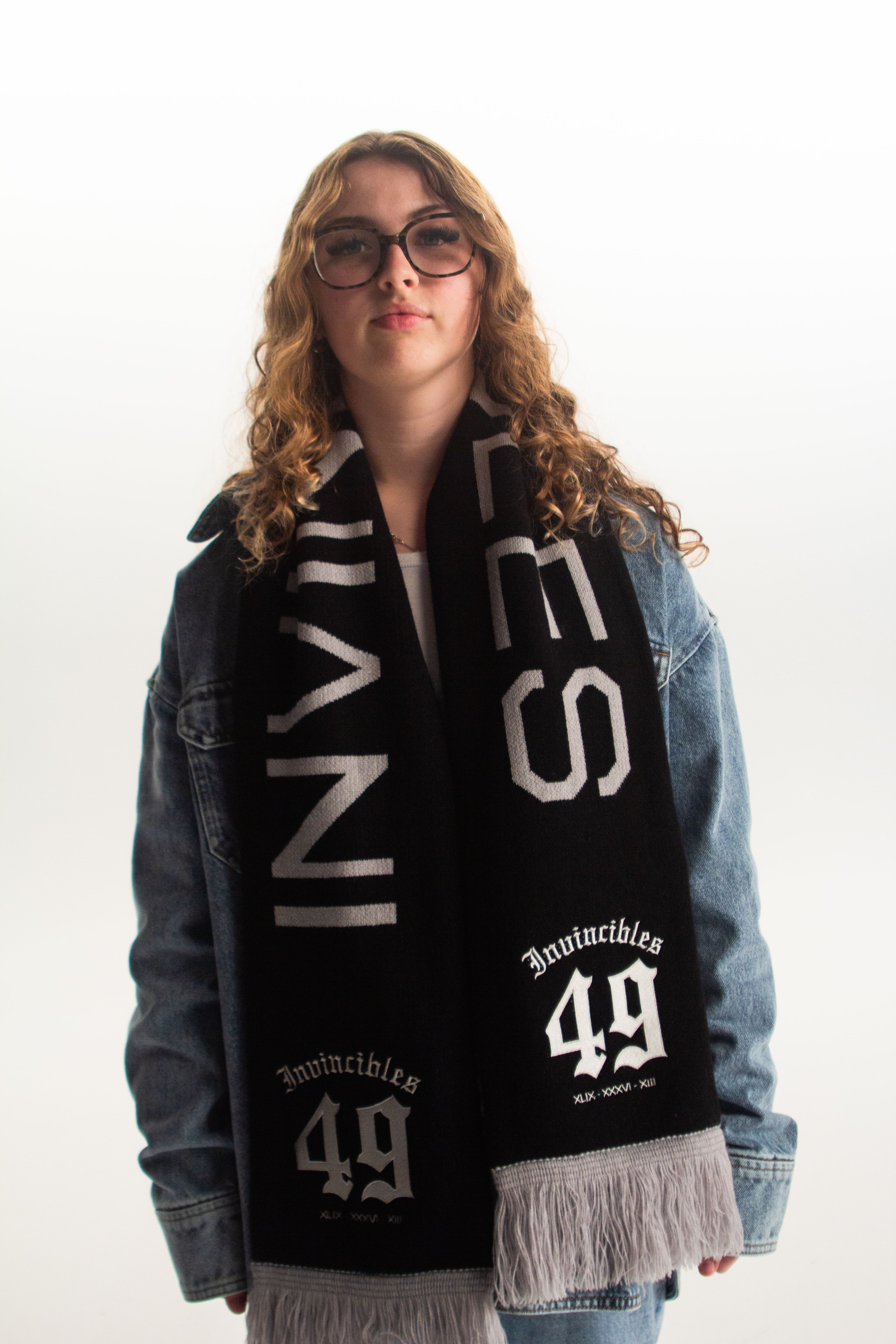 An image of an Arsenal supporter modelling the new Invincibles Collection