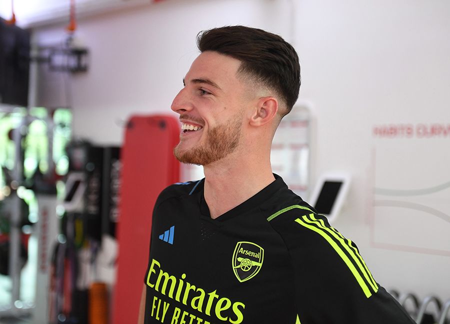 An image of Declan Rice smiling while in the gym