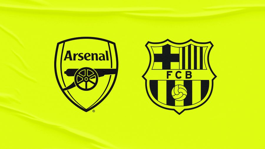 An image of the Arsenal and Barcelona crests