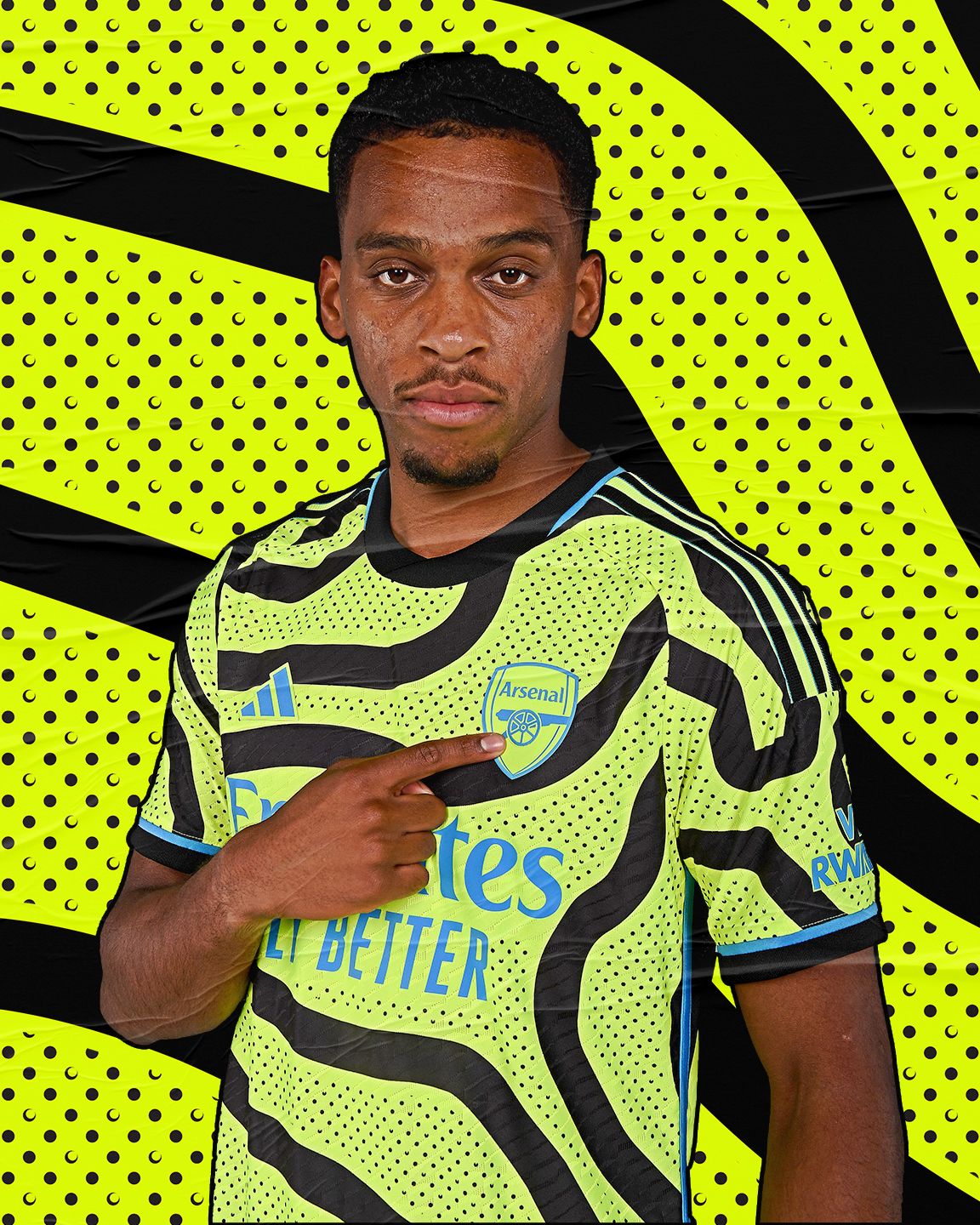 An image of Jurrien Timber in our 2023/24 men's team away shirt, pointing at the Arsenal badge