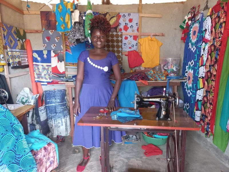 Irene’s income has enabled her to start a seamstress business