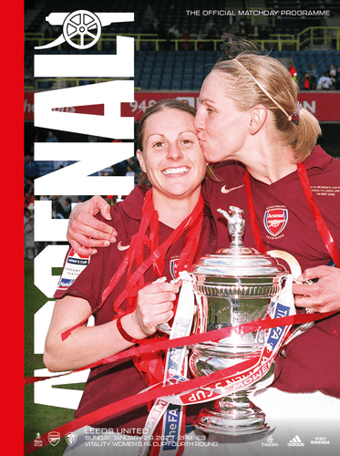 Kelly Smith holds the FA Cup trophy as Faye White kisses her forehead. Text reads: Arsenal Women v Leeds United. Women's FA Cup Fourth Round. Sunday, January 29, 2023
