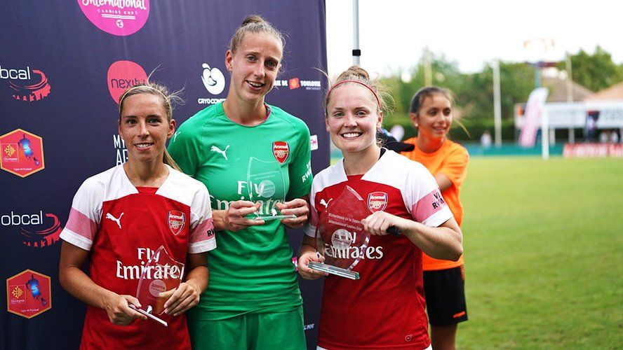Arsenal Women lift their trophies