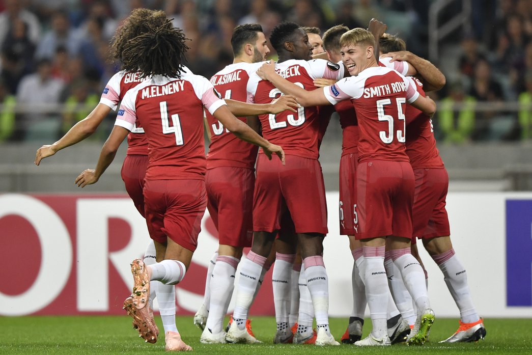 The Arsenal team celebrate Sokratis' goal at Qarabag