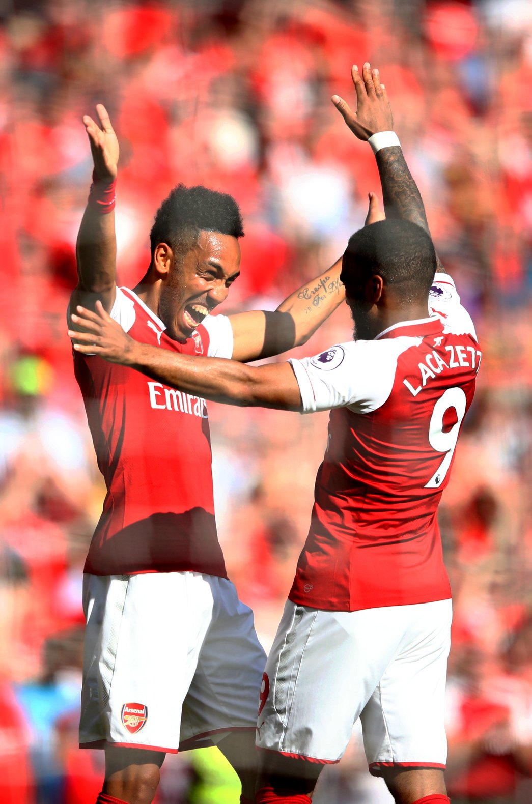 Aubameyang and Lacazette celebrate our first goal against Burnley