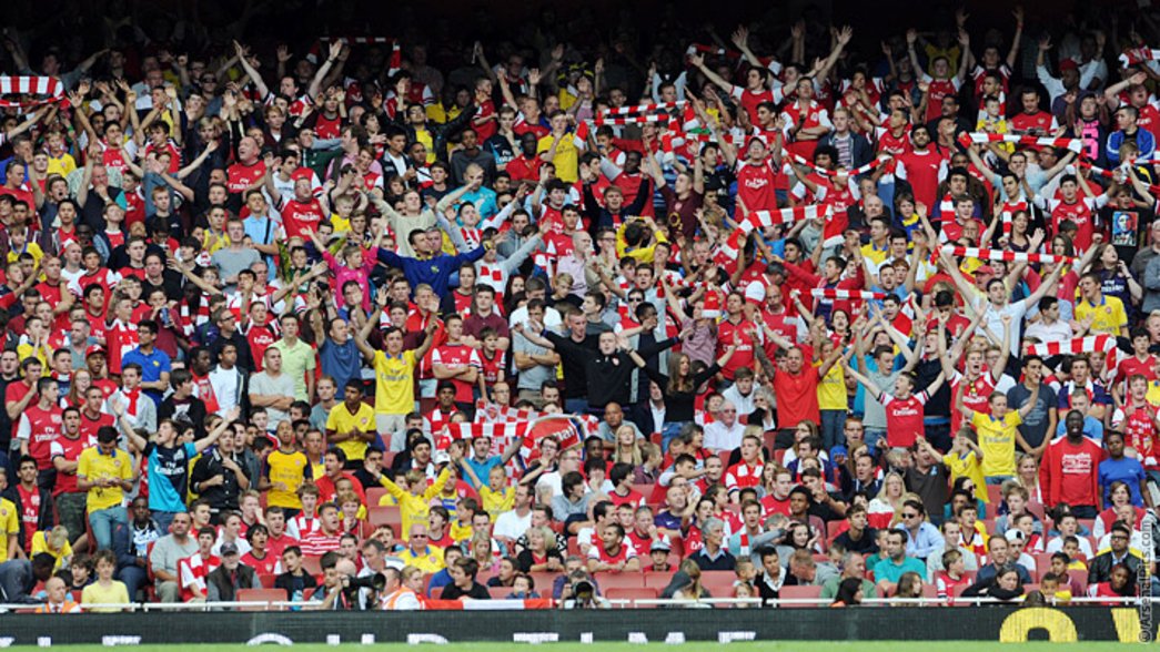 Arsenal fans celebrate beating Spurs