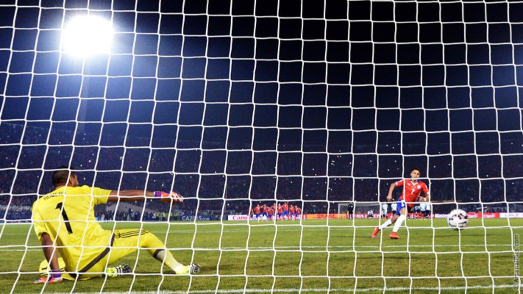 Alexis Sanchez scores the winning penalty in the Copa America final
