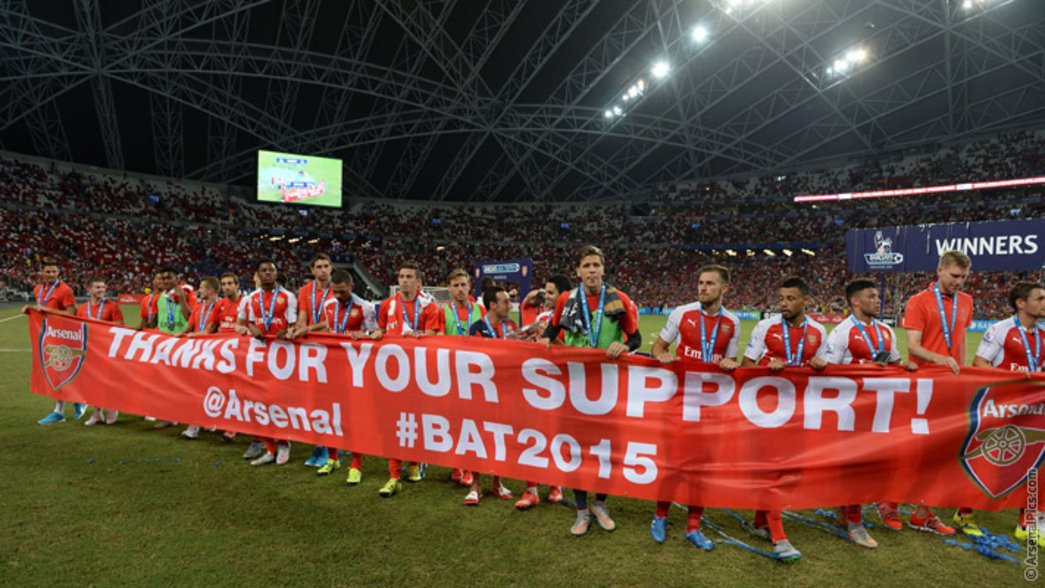 The Arsenal players thank the fans in Singapore