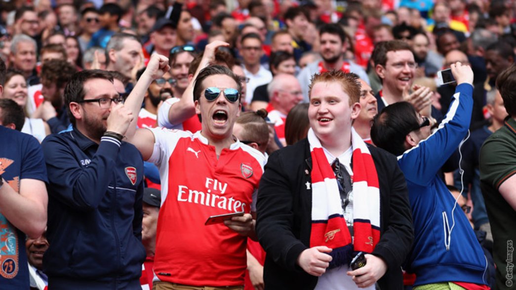 Arsenal fans celebrate against Aston Villa