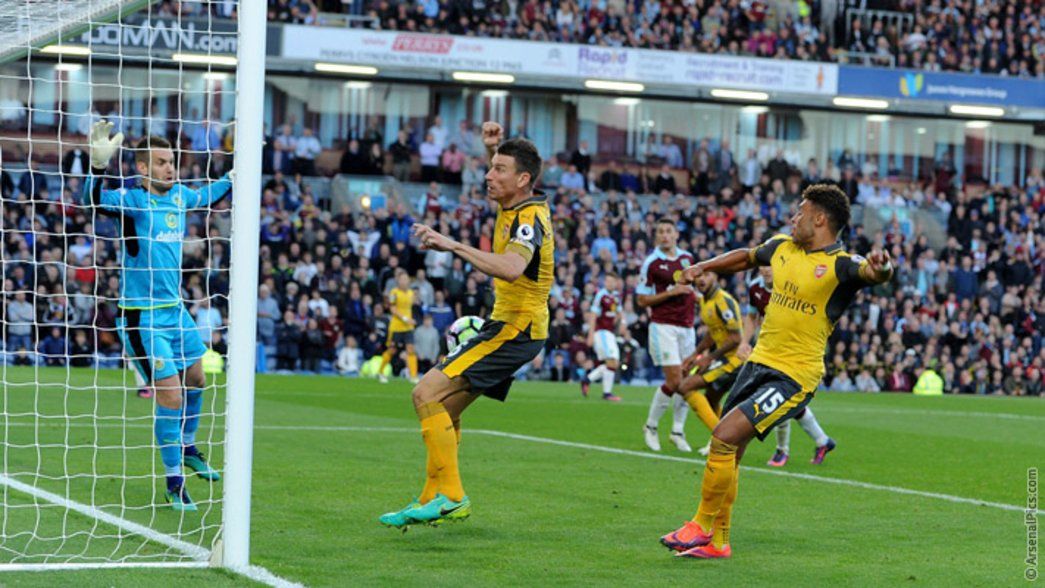 Laurent Koscielny forces the ball over the line at Burnley