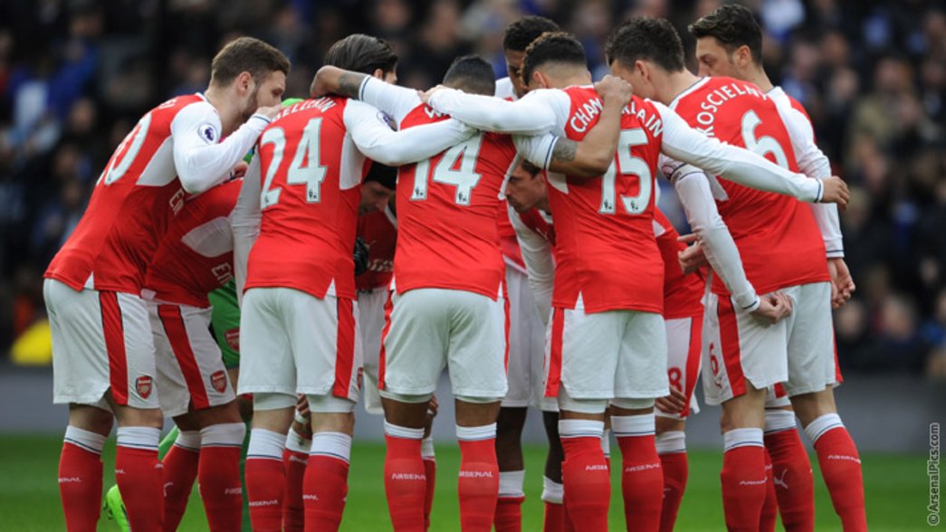 The Arsenal team huddle