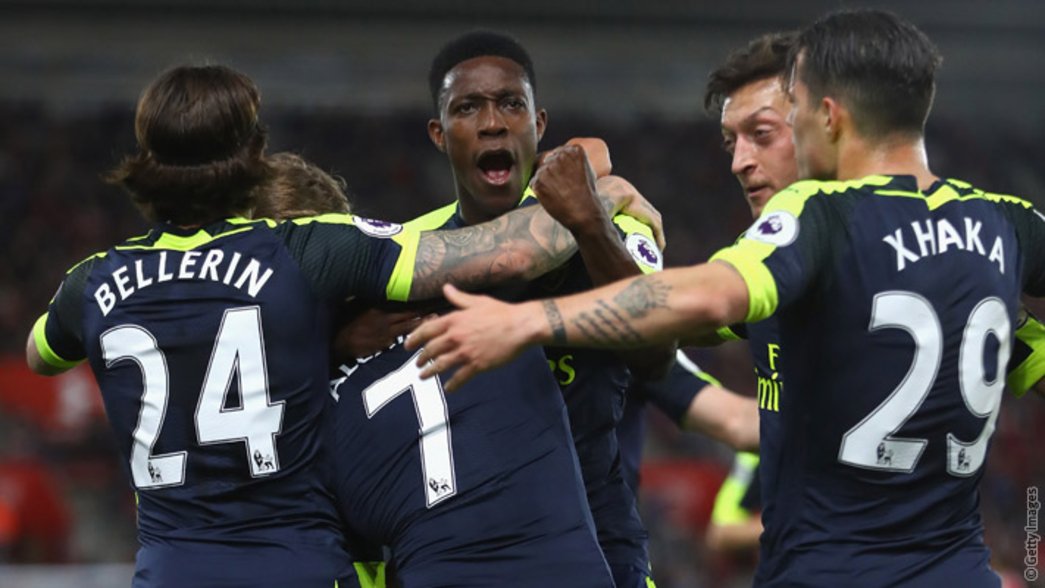 The team celebrate Alexis' opening goal in the 2-0 win at Southampton