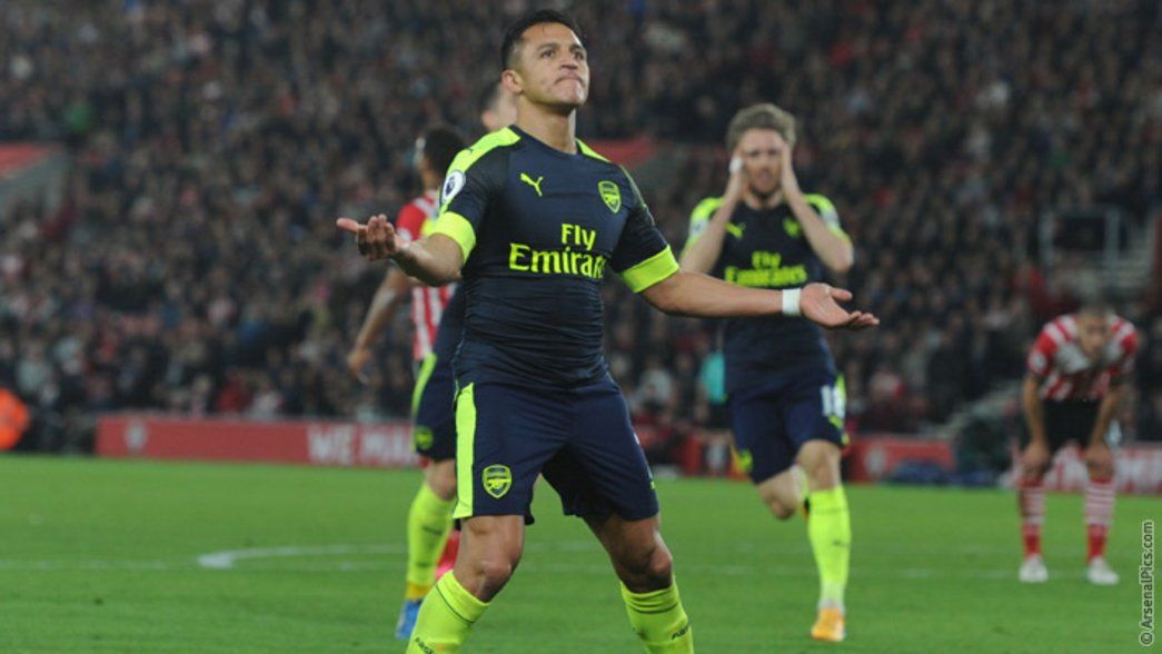 Alexis celebrates scoring against Southampton