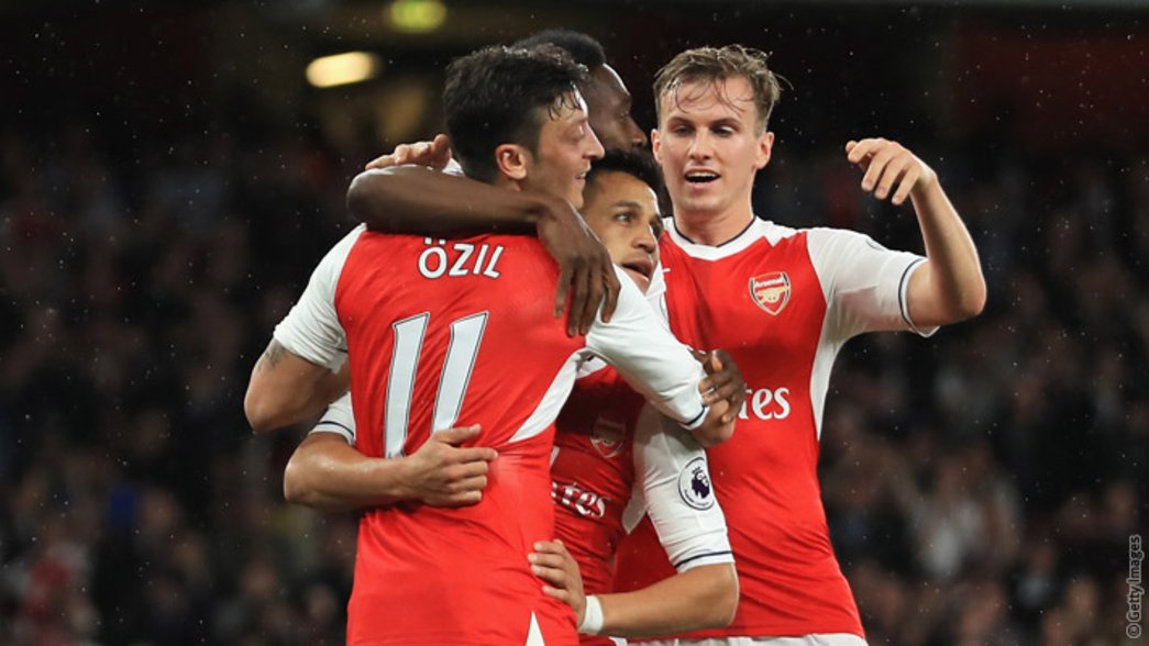 Arsenal celebrate Alexis scoring in the win over Sunderland