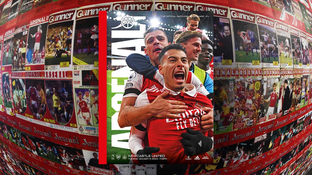 Front cover of the Arsenal v Newcastle United programme, featuring Gabriel Martinelli celebrating with the team