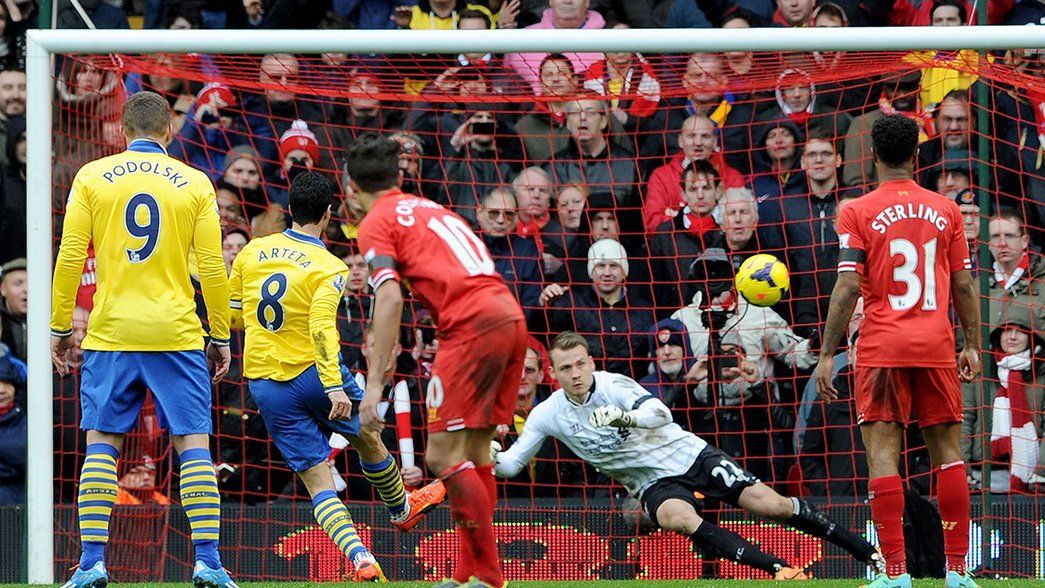 Arteta converts a penalty for Arsenal past Simon Mignolet at Anfield