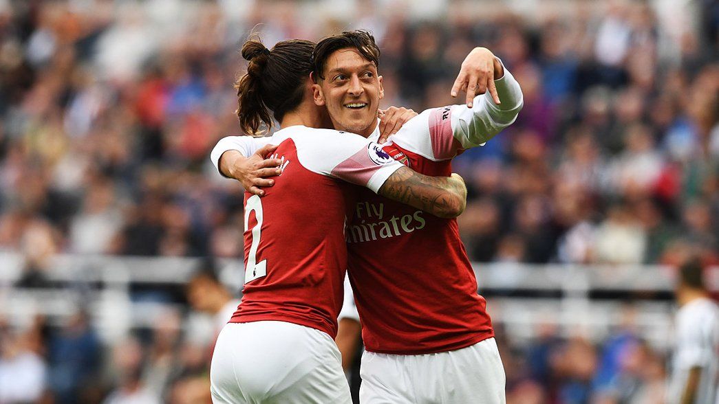 Hector Bellerin and Mesut Ozil celebrate our No 10's goal at Newcastle