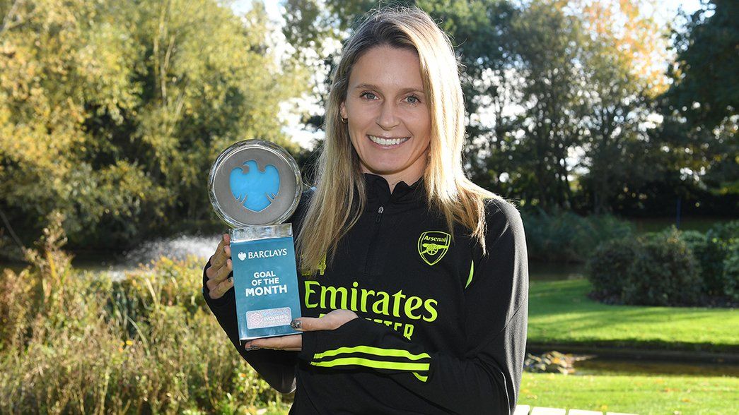 Cloe Lacasse holds up her Barclays WSL Goal of the Month award