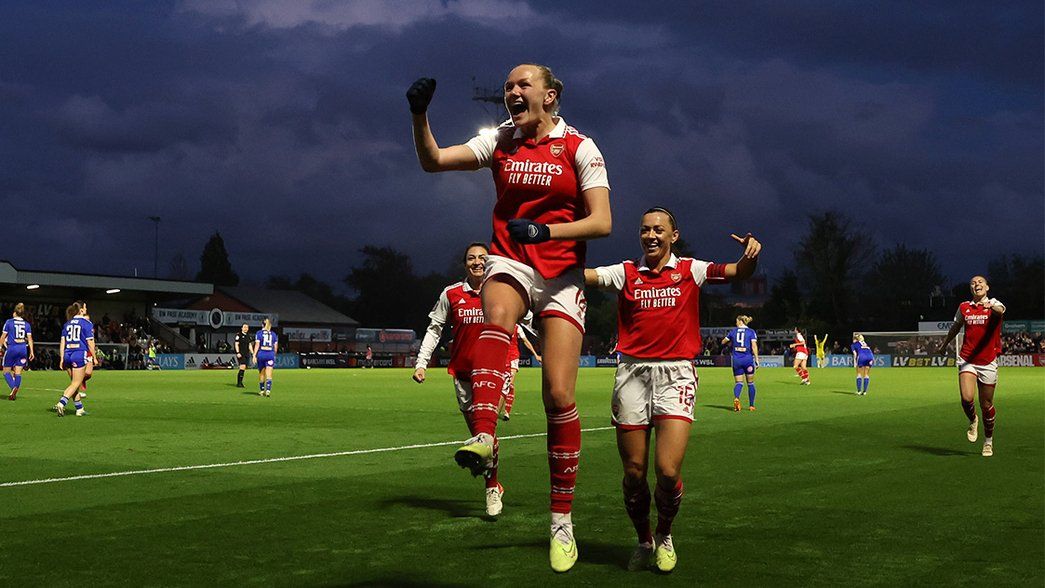 Frida Maanum jumps in the air in celebration after scoring against Leicester