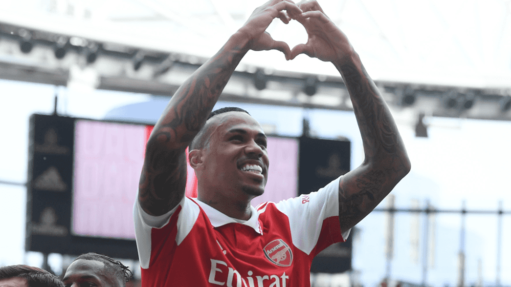 Gabriel celebrates by making a heart sign