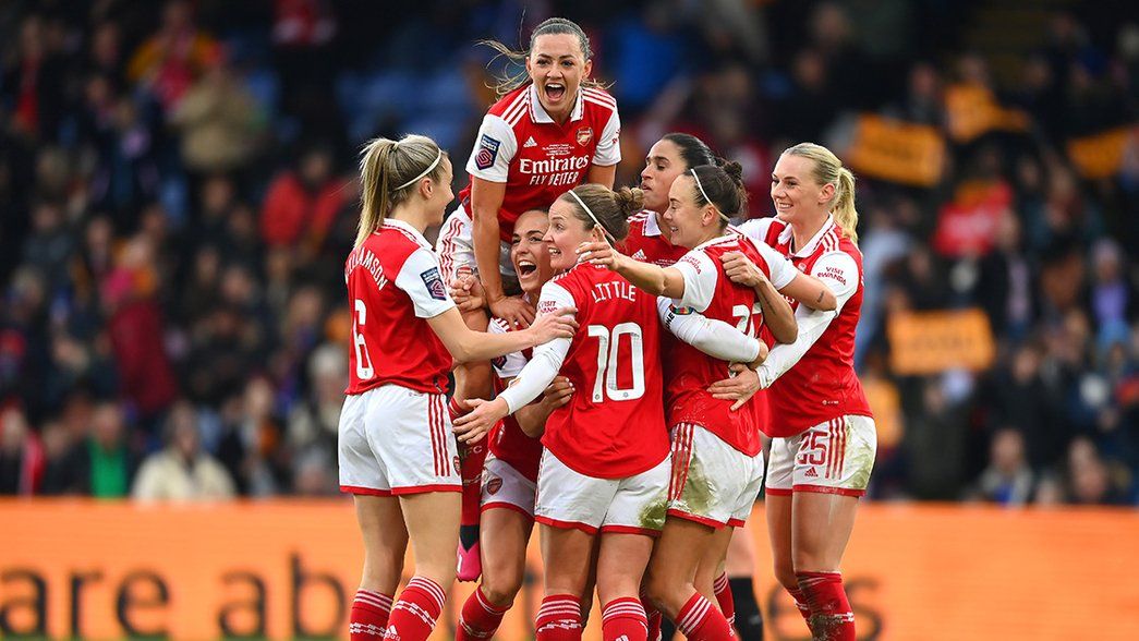 Arsenal celebrate the winner in the Conti Cup final