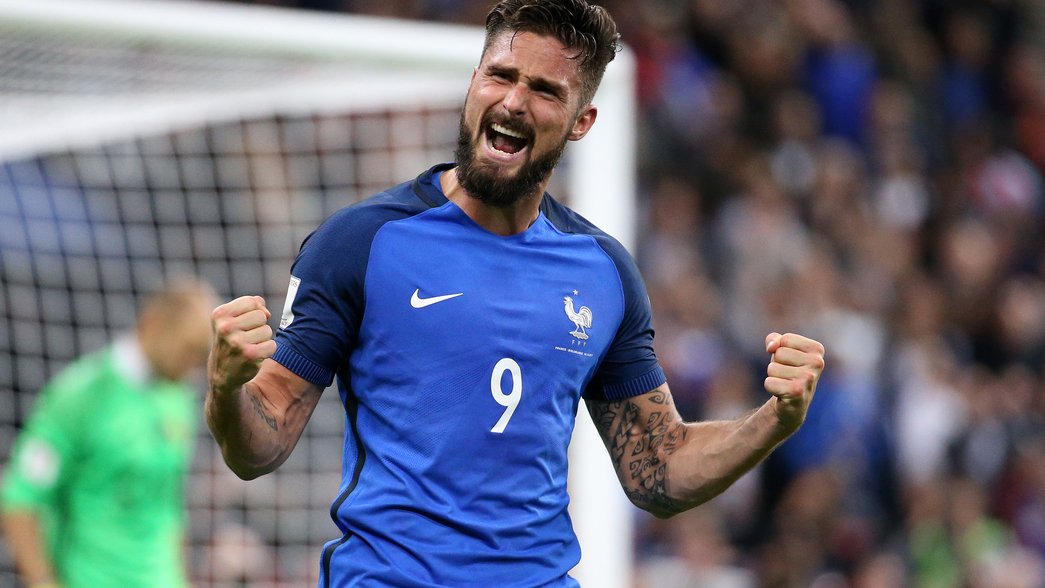 Olivier Giroud celebrates after scoring to help France reach the 2018 World Cup with a 2-1 win over Belarus
