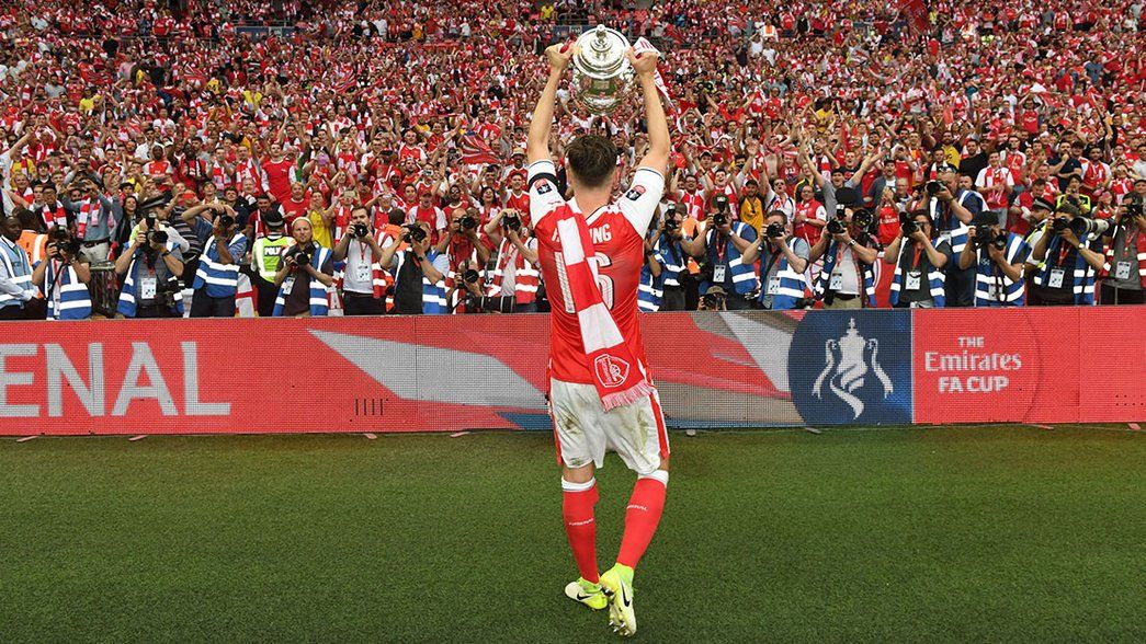 Rob Holding lifts the FA Cup at Wembley