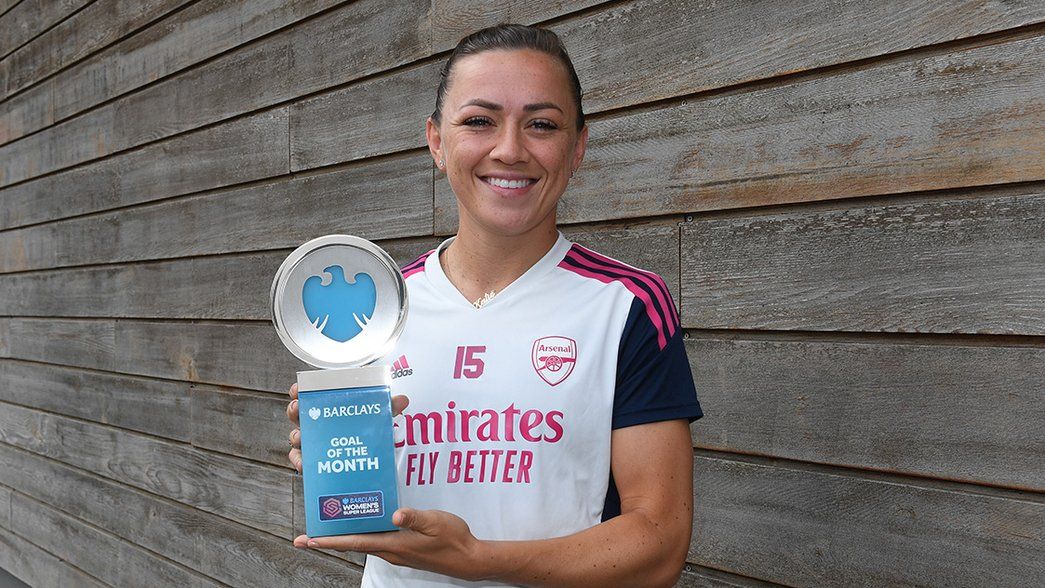 Katie McCabe poses with her Goal of the Month award