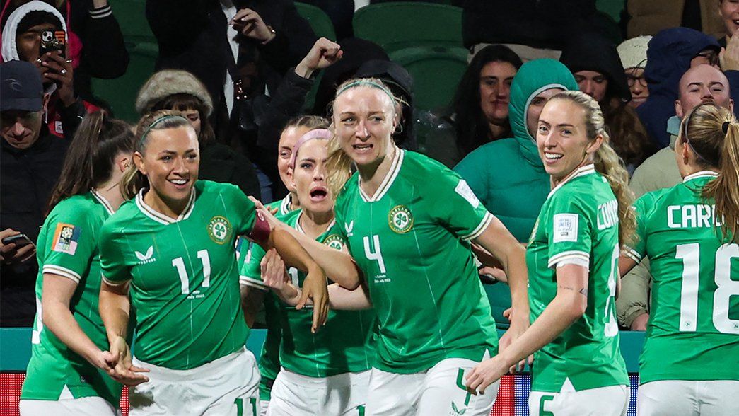 Katie McCabe celebrates with Louise Quinn and her Ireland teammates after scoring against Canada