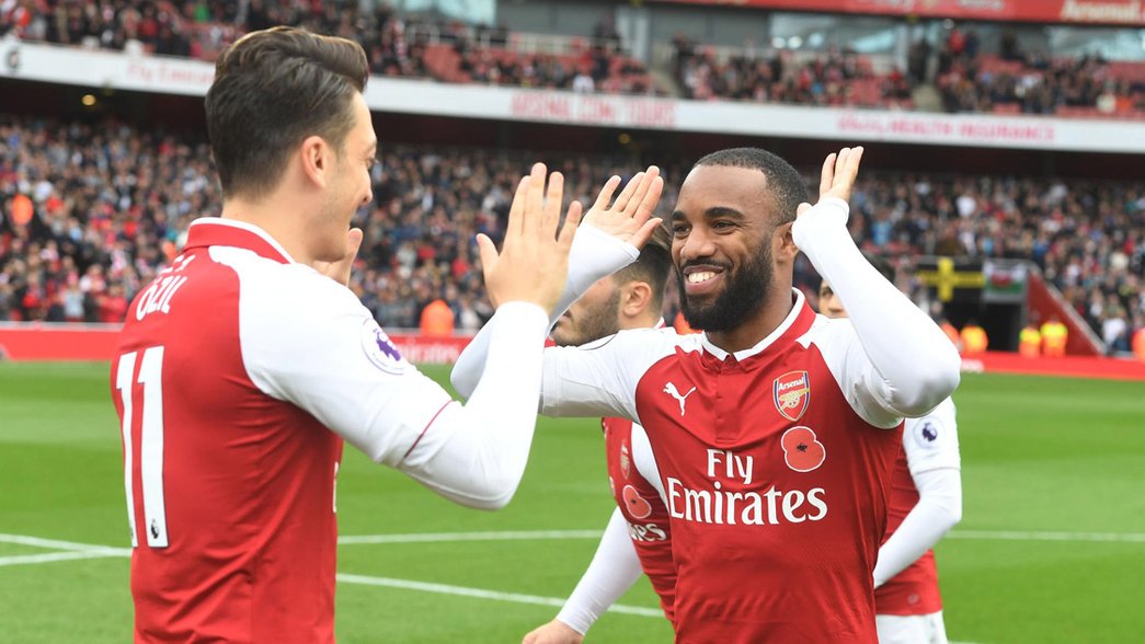 Mesut Ozil and Alexandre Lacazette before our game against Swansea City