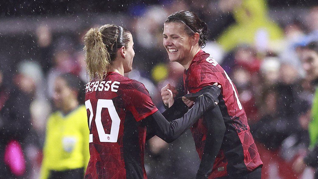 Cloe Lacasse with Christine Sinclair for the Canadian Women's Team
