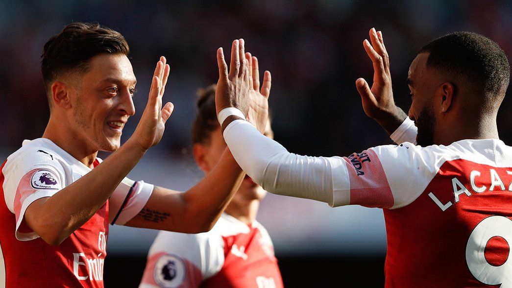 Ozil and Lacazette celebrate against Watford 