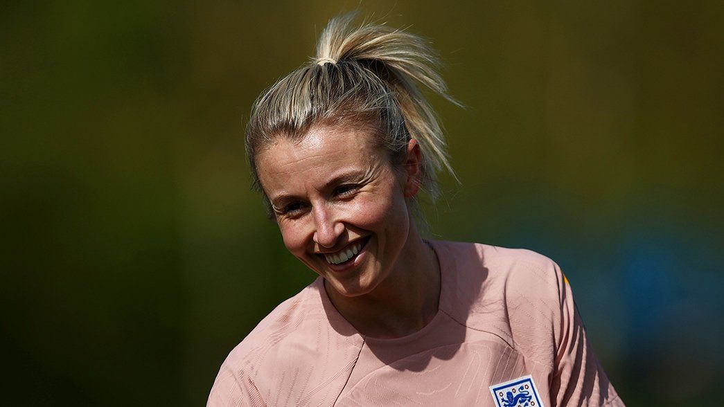 Leah Williamson smiles in training for England