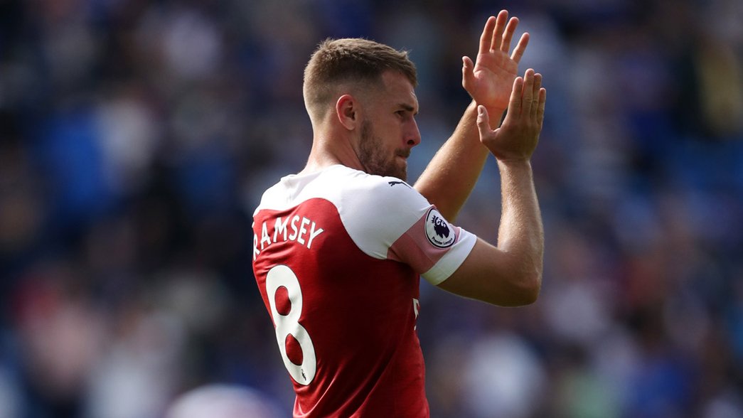 Aaron Ramsey applauds the fans after his return to Cardiff City