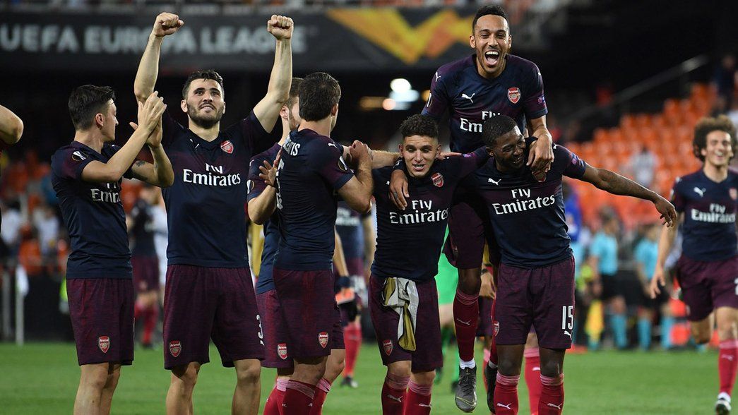 The Arsenal players celebrate reaching the Europa League final