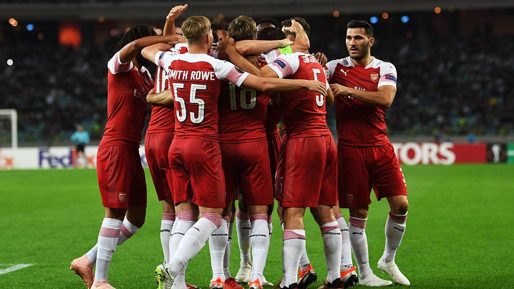 The Arsenal team celebrate Sokratis' goal against Qarabag