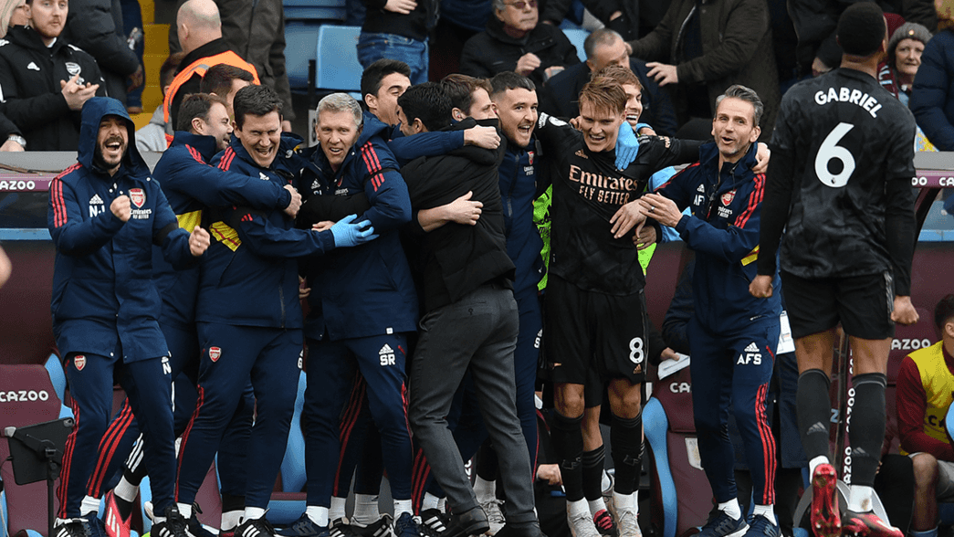 The bench celebrate at Aston Villa