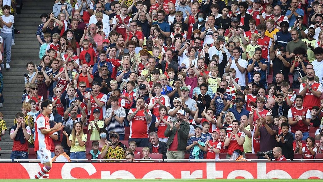 Takehiro Tomiyasu is applauded by Arsenal fans after his debut