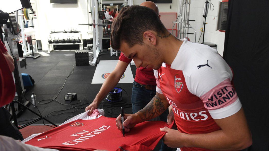 Lucas Torreira signs an Arsenal shirt - and you could win it