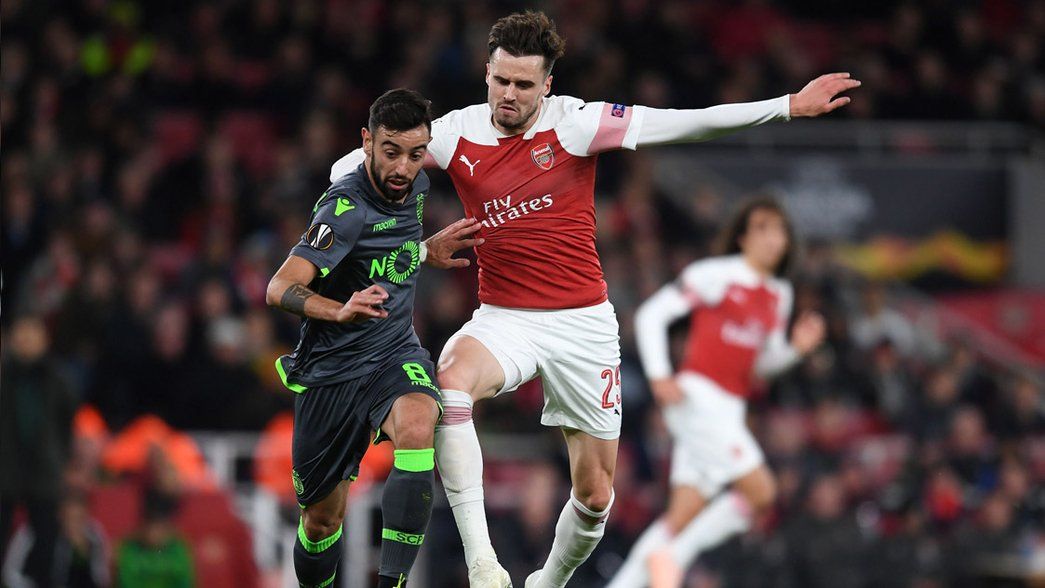 Carl Jenkinson in action against Sporting CP