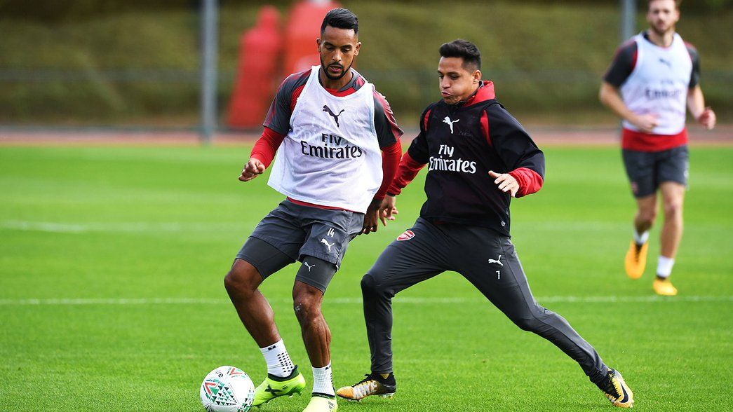 Theo Walcott and Alexis in training